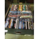 A tray containing a quantity of DVDs