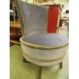An early 20th century bedroom chair upholstered in a blue Draylon fabric