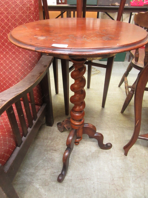 A late-Victorian mahogany pedestal table with circular top