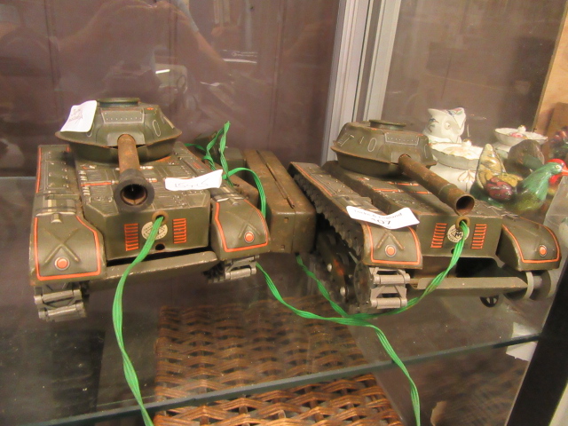 Two mid-20th century tin plate battery operated tanks