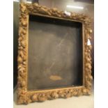 An ornate gilt framed picture frame