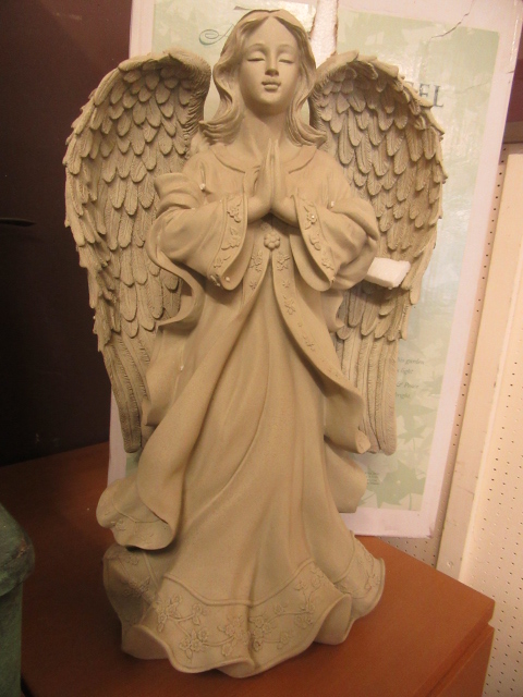 A garden angel with box