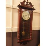 A reproduction drop-dial wall clock