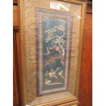 Two framed and glazed oriental silk plaques