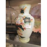 A hand painted glass vase