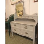 A mid-20th century grey painted dressing table having two drawers above one long drawer,