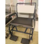 A heavy duty commode chair