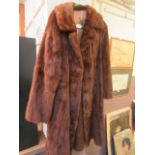 A brown fur coat