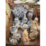 A tray containing Oriental style blue and white vases, teapots,