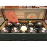 A boxed set of carpet bowls