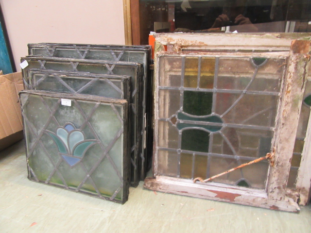 A large quantity of leaded stained glass panels