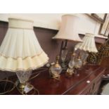 Six assorted brass and glass table lamps,