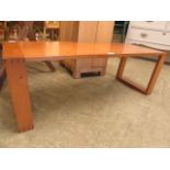 A mid-20th century elm coffee table