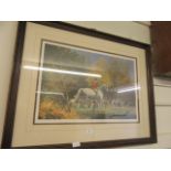 A framed and glazed hunting print signed in pencil