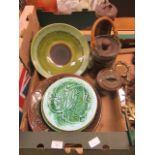 A tray containing leaf design plates, bowls,