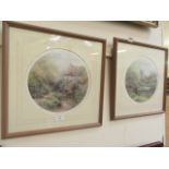 A pair of framed and glazed limited edition prints of church and cottage scene signed in pencil