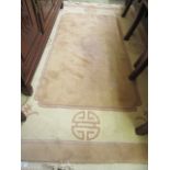 A beige Chinese style rug