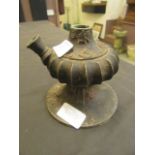 A cast metal eastern vessel