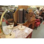 Two mid-20th century design PVC circular mirrors