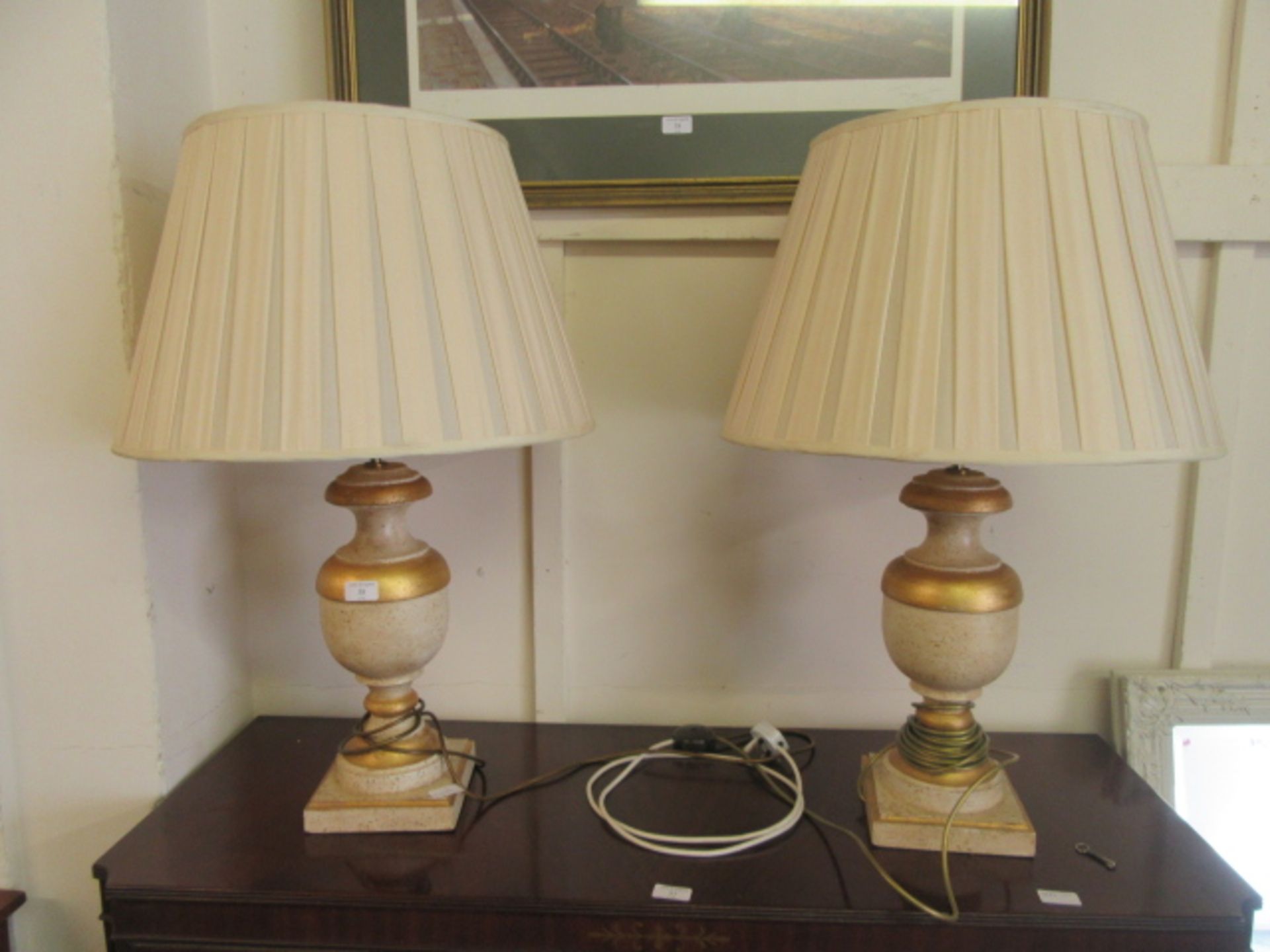 Two modern parcel gilt table lamps