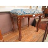 A reproduction mahogany regency style stool