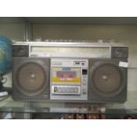 A mid-20th century Hitachi portable stereo radio cassette recorder