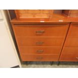 A mid-20th century chest of four drawers