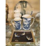 A boxed Wade flying birds set along with two blue and white jugs, two lamps,