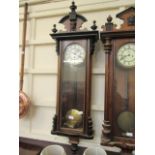 A late Victorian mahogany Vienna wall clock with weight