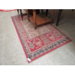 A red ground rug