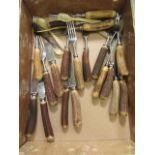 A box of bone handled flatware