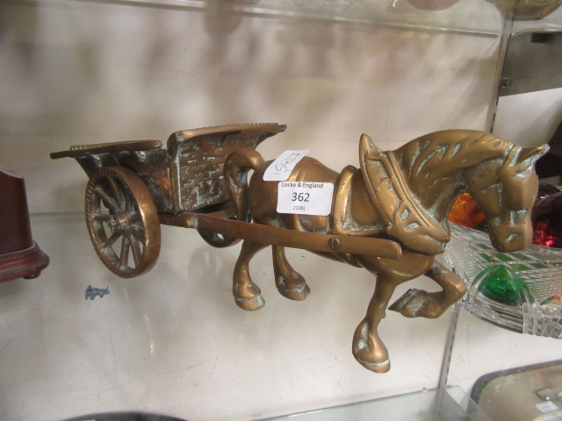 A brass horse and cart