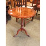 A reproduction yew pedestal wine table