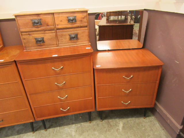 A mid-20th century four drawer chest of drawers together with a matching three drawer dressing