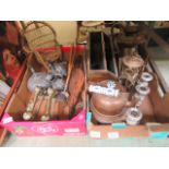 Two trays containing fireside dog rests, magazine rack, brass ware, candelabra etc.