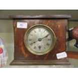 A mid-20th century oak cased mantle clock