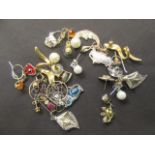 A bag containing a quantity of assorted earrings, ear studs, etc approx weight 45.