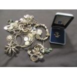 A box containing a quantity of white metal and silver jewellery approx weight 340g