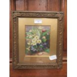 A gilt framed and glazed watercolour of primroses