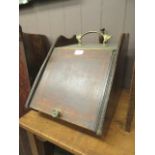 A mahogany inlaid coal box with shovel