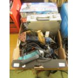 A tray containing router, drill, jig saw, chainsaw sharpener,