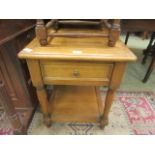 A reproduction wooden hall table with single drawer and open storage