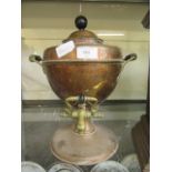 A brass and copper samovar