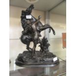 A painted spelter figure of rearing horse