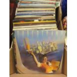 A tray containing a quantity of LPs by various artists to include The Cure, Billy Joel, Abba,