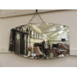 A mid-20th century bevel glass wall mirror