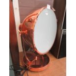 A reproduction copper effect spotlight