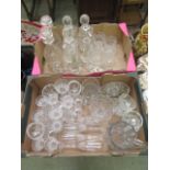 Two trays of glassware to include decanters, drinking vessels, water jugs,