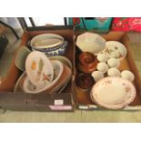 Two trays of ceramic table ware to include tureens, serving dishes,