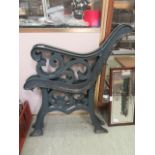 A pair of green painted cast iron bench ends CONDITION REPORT: We do not deal with